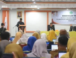 Rum Pagau Tekankan Pentingnya Pemanfaatan Teknologi Informasi dalam Reformasi Birokrasi